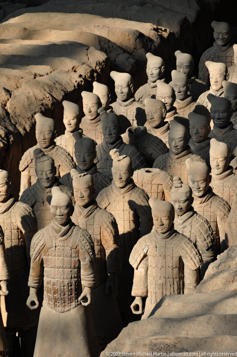 Rows of terracotta infantry figures with varied faces and hairstyles at the Mausoleum of the First Qin Emperor near Xi’an.