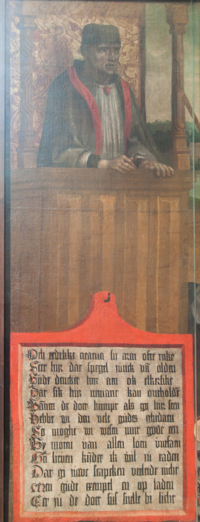 Painted memorial figure above a large rectangular German inscription panel on Johann Hobing’s Epitaph, dated about 1558.