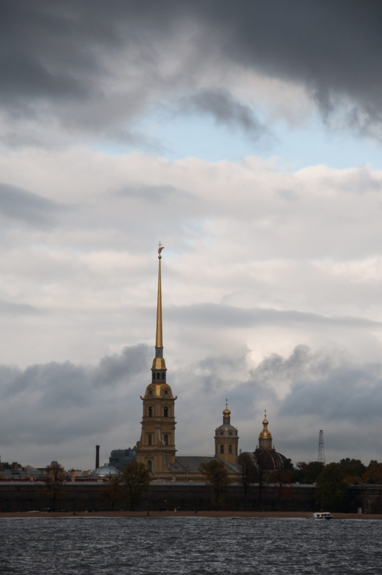 Peter and Paul Fortress across the Neva River, dominated by the tall gilded spire of Peter and Paul Cathedral.