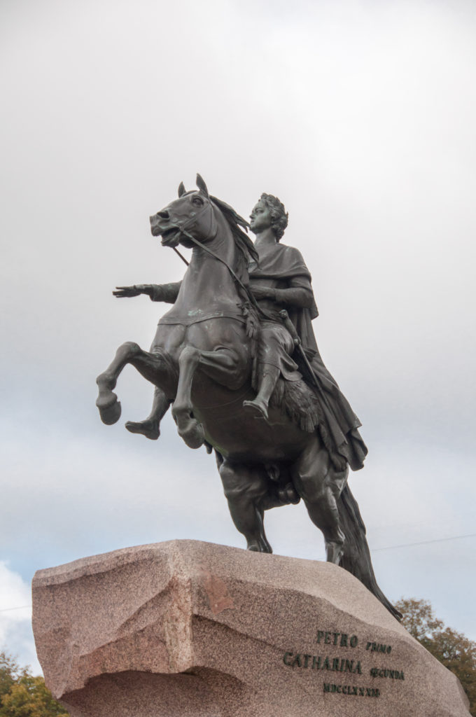 Bronze Horseman monument with Peter the Great on a rearing horse above a massive pink granite pedestal.