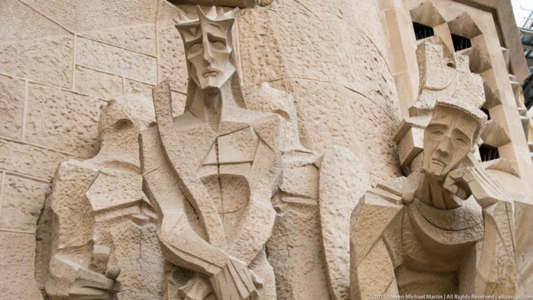 Subirachs’s Ecce Homo group on the Sagrada Família Passion façade, with Christ centered among angular stone figures.