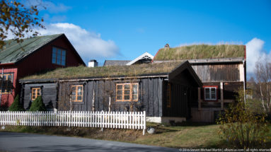 Traditional Timber building with sod roof by Steven Michael Martin