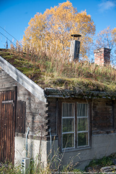 Traditional Timber building with sod roof by Steven Michael Martin