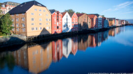 Colorful houses on the river Nidelven in Trondheim by Steven Michael Martin