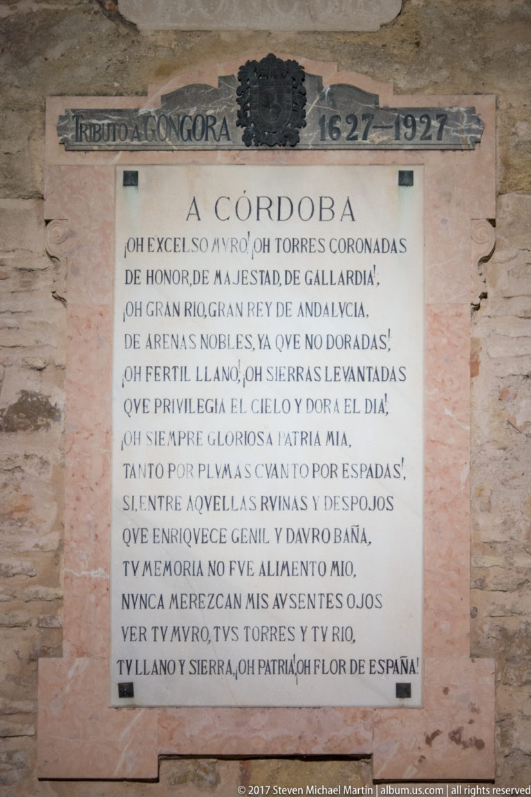 Wall plaque headed Góngora 1627–1927 displaying the Spanish poem “Córdoba” in large black lettering.