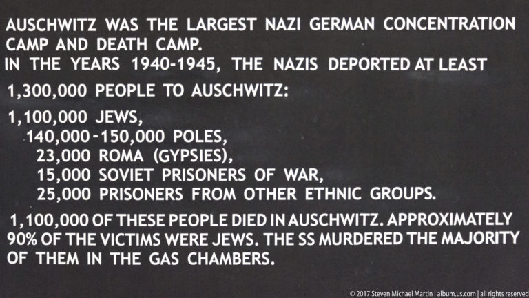 English historical panel listing estimated deportations and deaths at Auschwitz from 1940 to 1945.