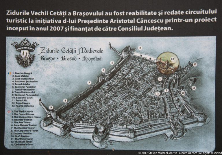 Interpretive map showing medieval Brașov enclosed by walls, bastions, gates, and labeled landmarks.