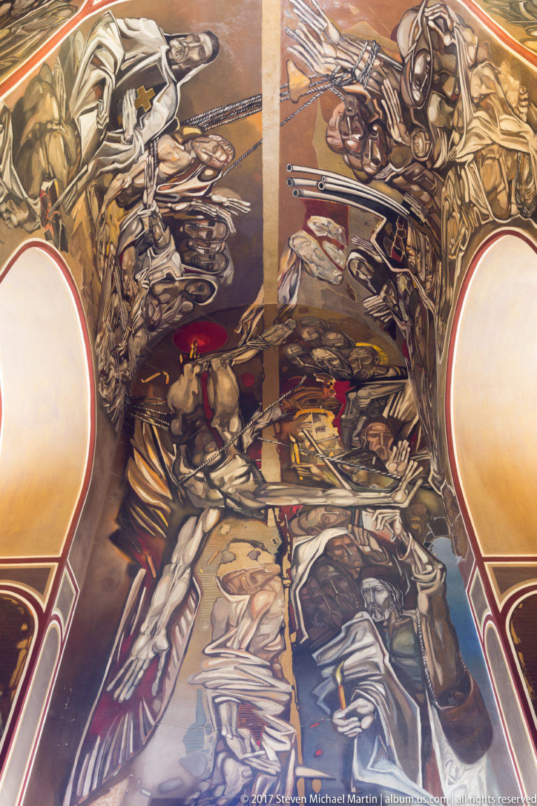 Teofan Sokerov mural with angular human figures, weapons, drapery, and strong dark outlines inside the Patriarchal Church.