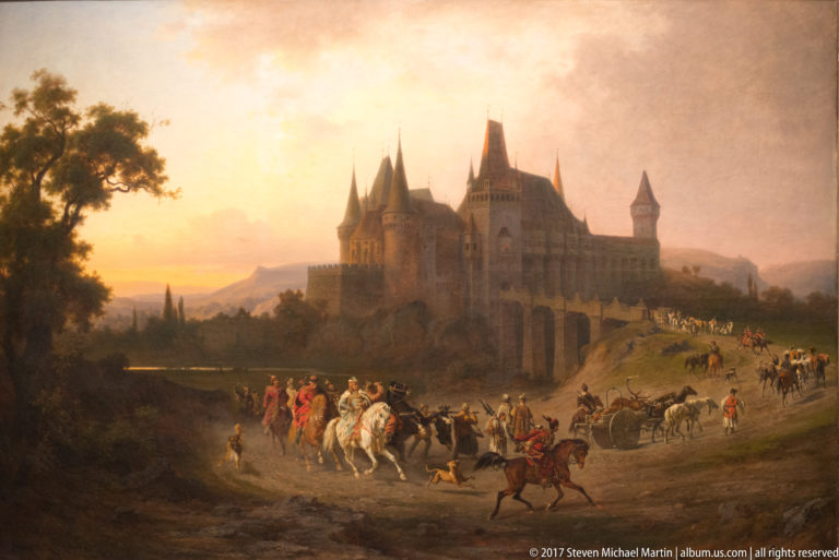 Romantic landscape painting of a hilltop castle above a road crowded with riders and horse-drawn vehicles.