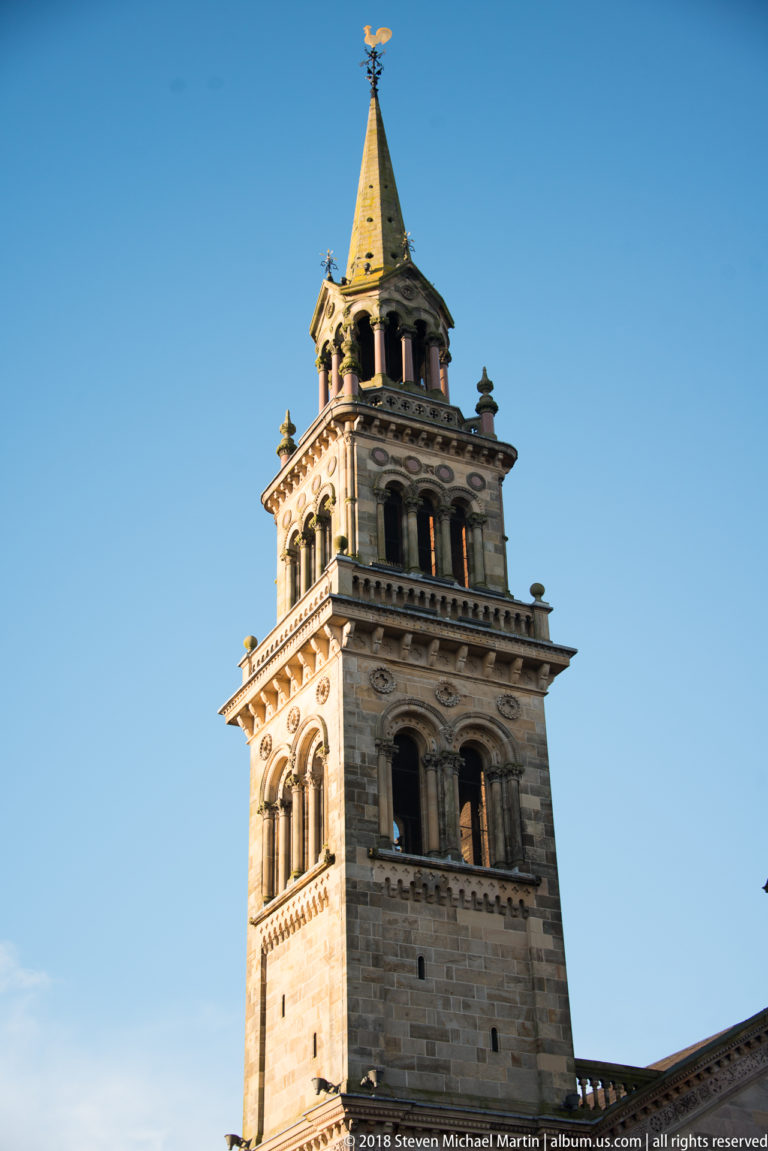 Arcaded upper stages and pyramidal roof of W. J. Barre’s 1865 campanile at the former Methodist Church on University Road.