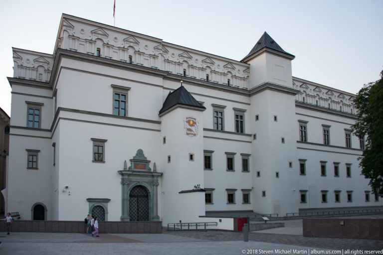 Pale Palace of the Grand Dukes with rectangular windows, corner towers, decorative roofline, and ornate central portal.