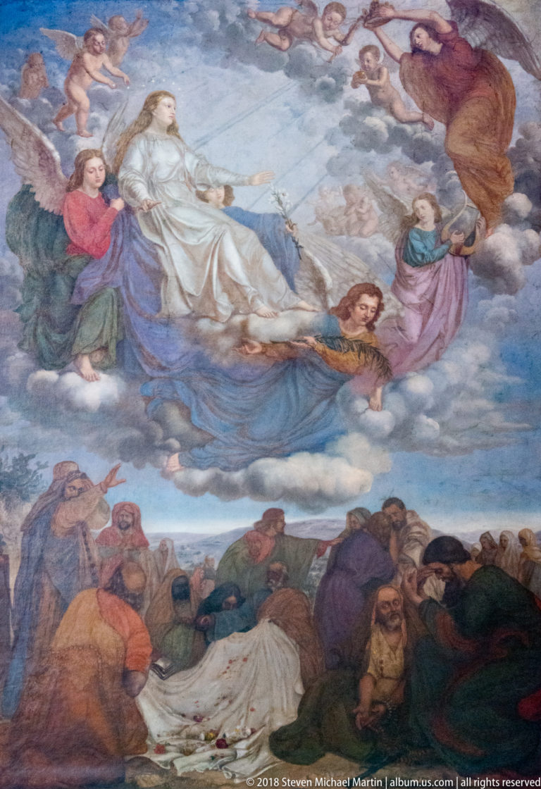 Baroque ceiling painting of a radiant woman ascending among angels above a group of figures on the ground.