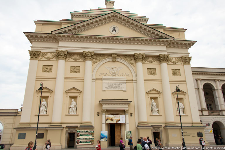 St. Anne's Church facade with triangular pediment, Corinthian columns, sculpted niches, and central entrance.