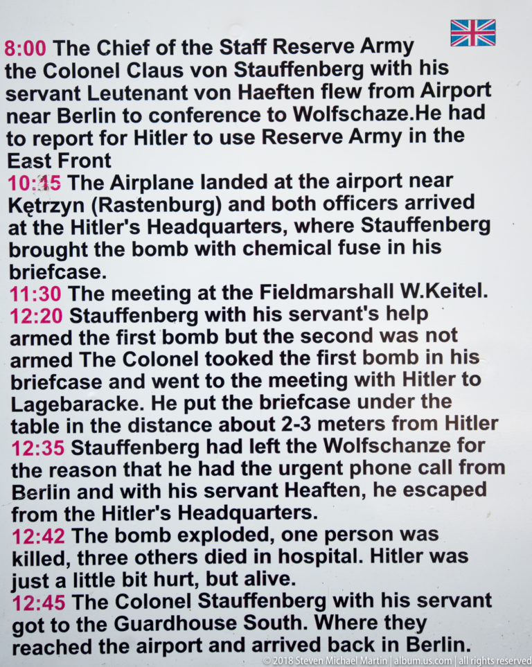 English-language interpretive panel with red time stamps describing Stauffenberg’s actions during the 20 July 1944 attack.