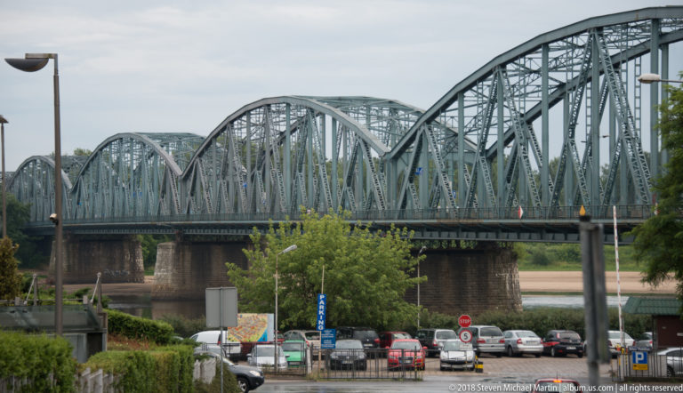 Steel arched truss spans of the Józef Piłsudski Bridge crossing the Vistula at Toruń.