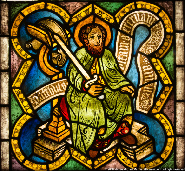 Saint Matthias seated with an axe-like attribute and a scroll explicitly naming Matthias.