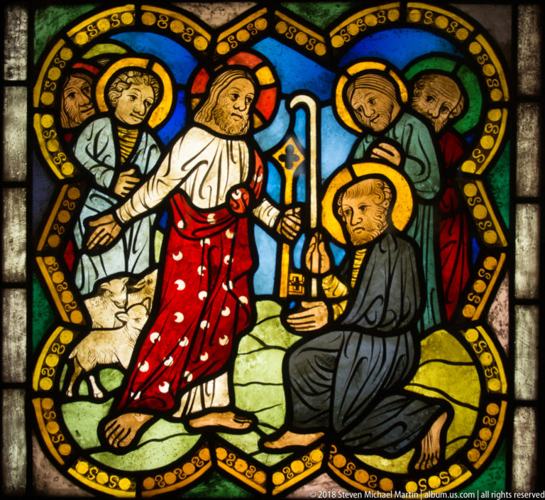Christ stands beside sheep before a kneeling haloed disciple holding a long staff, with witnesses behind.