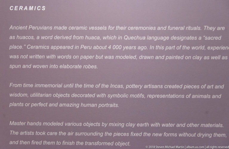Museum wall text explaining ancient Peruvian pottery, ceremonial vessels, huacos, clay modeling, decoration, and firing.