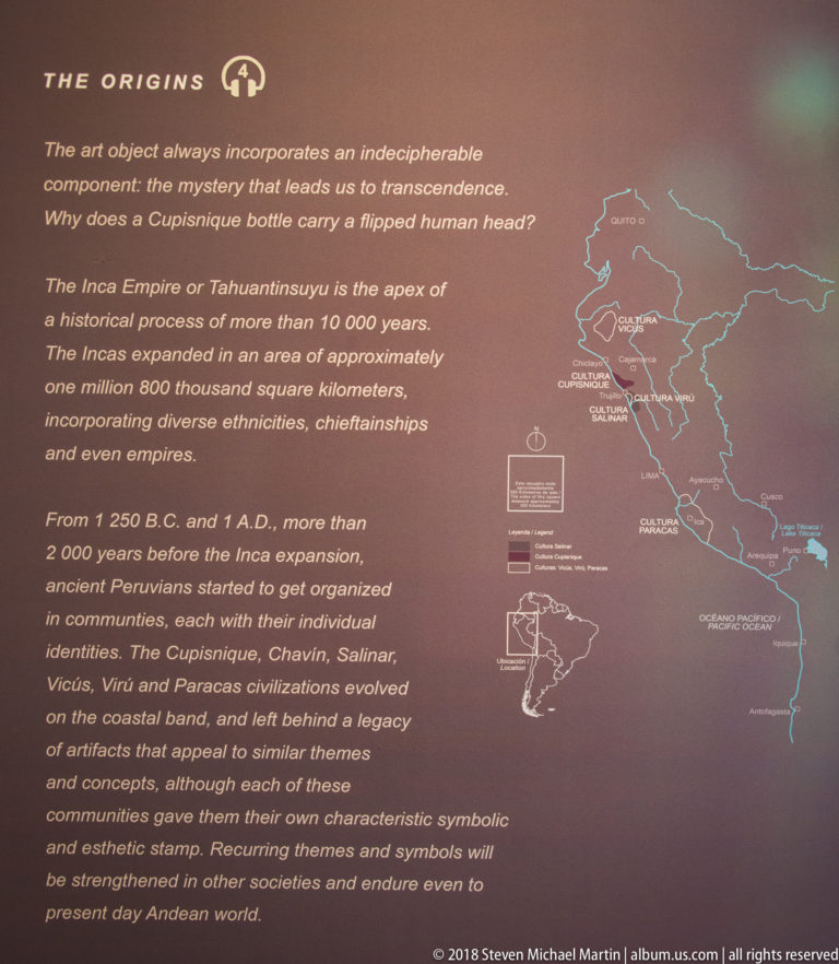 Large museum wall panel about the Inca Empire, with historical text, map of western South America, and small artifact illustrations.