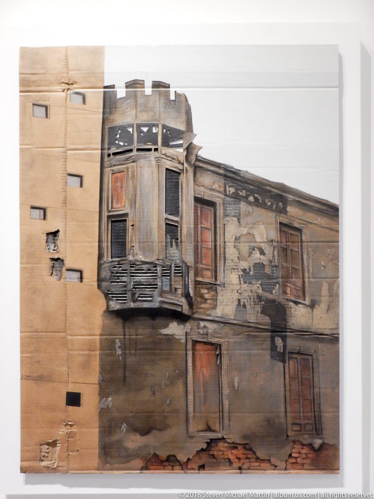 Architectural artwork showing a weathered façade with dark projecting wooden balcony, boarded windows, and exposed brick.