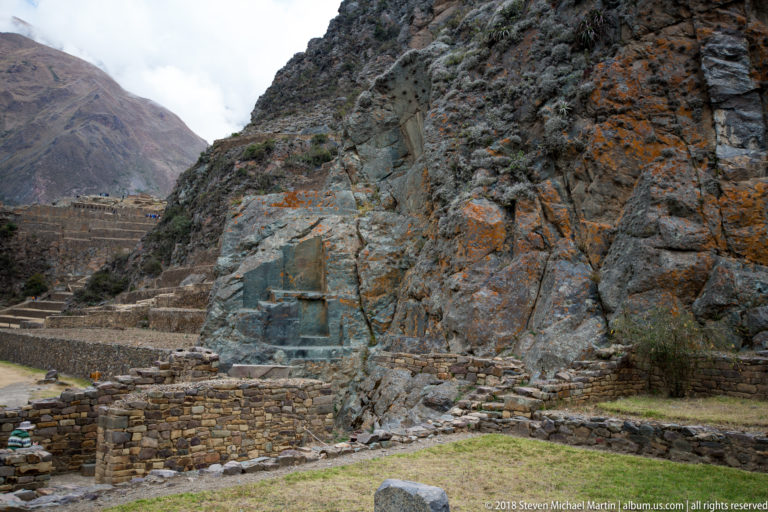 Angular bedrock with cut surfaces beside stone retaining walls and terraces at Ollantaytambo.