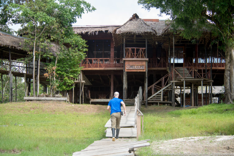Boardwalk leading to elevated entrance at Tuhauyo Lodge.