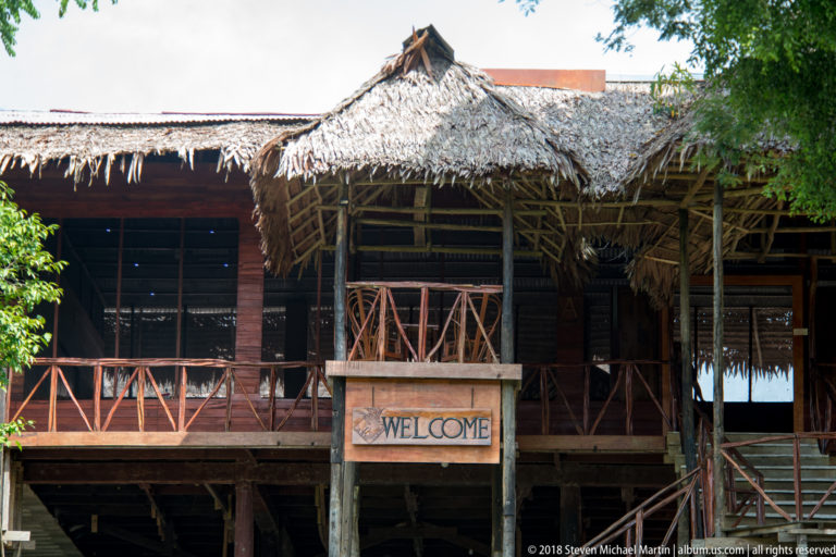 Welcome sign and thatched entrance bay at Tuhauyo Lodge.
