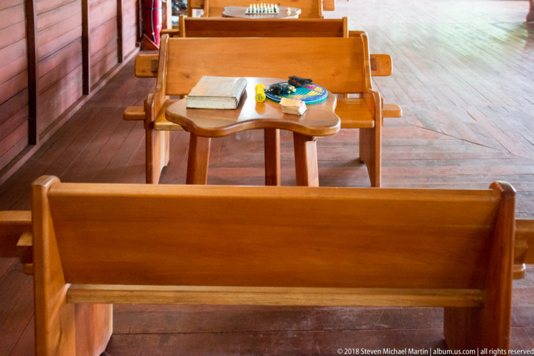 Built-in board-game table and benches at Tuhauyo Lodge.