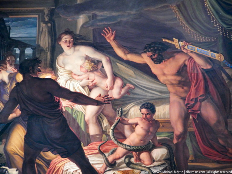 Large framed or ceiling painting with multiple figures in a richly decorated Pitti Palace interior.