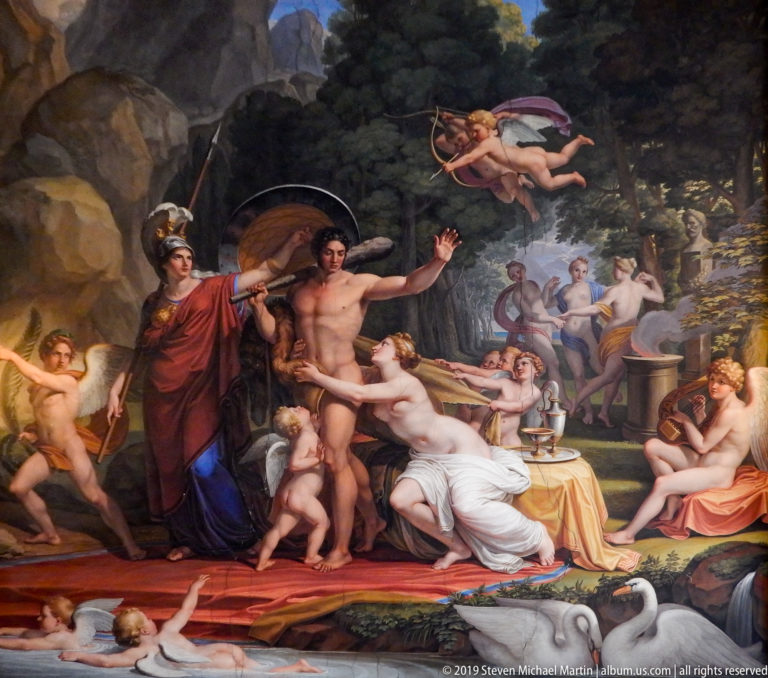 Large framed or ceiling painting with multiple figures in a richly decorated Pitti Palace interior.