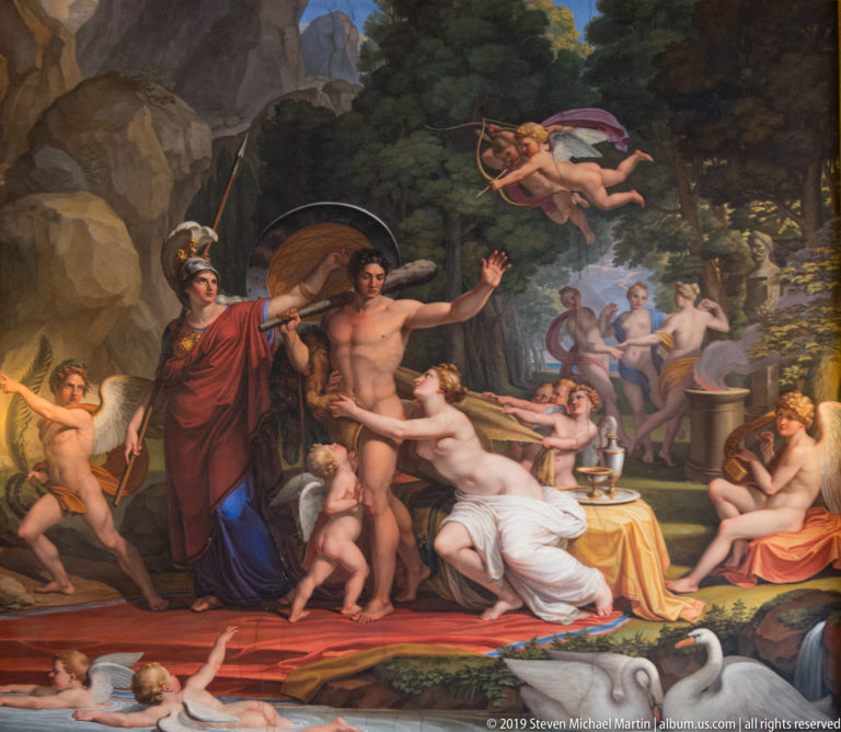 Large mythological painting with helmeted warrior, nude male figure, seated women, putti, and figures in a wooded landscape.