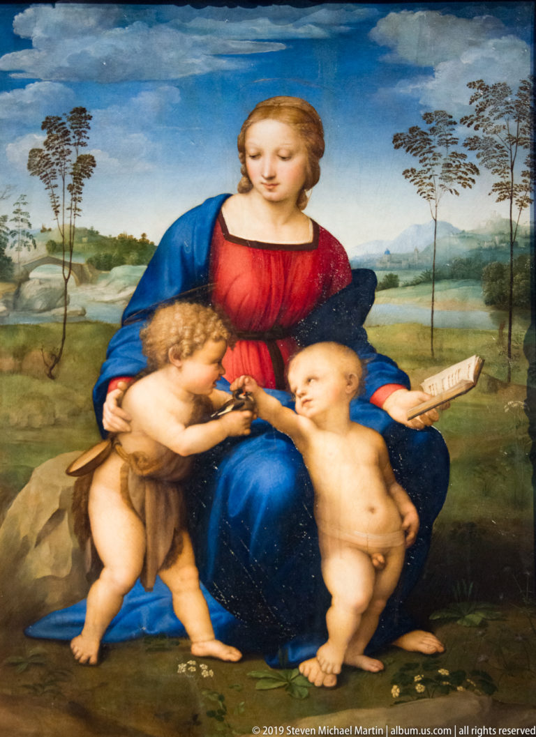 Raphael’s Madonna of the Goldfinch, with Mary watching the Christ Child and young John the Baptist share a small bird.