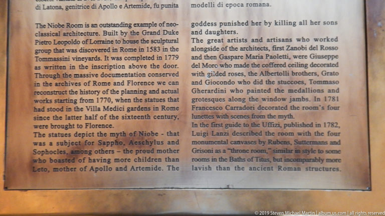 Museum interpretation panel with English text discussing Niobe, the sculptural group, and decoration of the room.