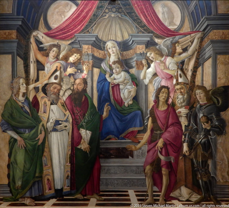 Enthroned Virgin and Child beneath a canopy, surrounded by saints, angels, clerics, and an armored figure.