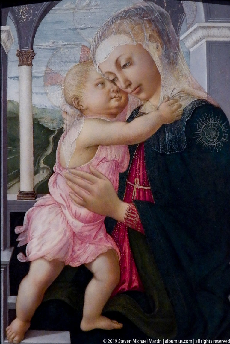 Detail of Botticelli’s Madonna della Loggia with the Christ Child embracing Mary and pressing his face close to hers.