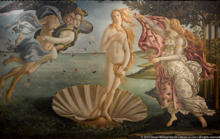 Full view of Botticelli’s Birth of Venus with Venus on a shell, wind gods at left, and a mantle-bearing attendant ashore.