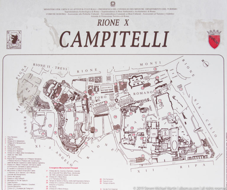 Information panel headed 'Rione X Campitelli' with a detailed map of central Rome's archaeological district.