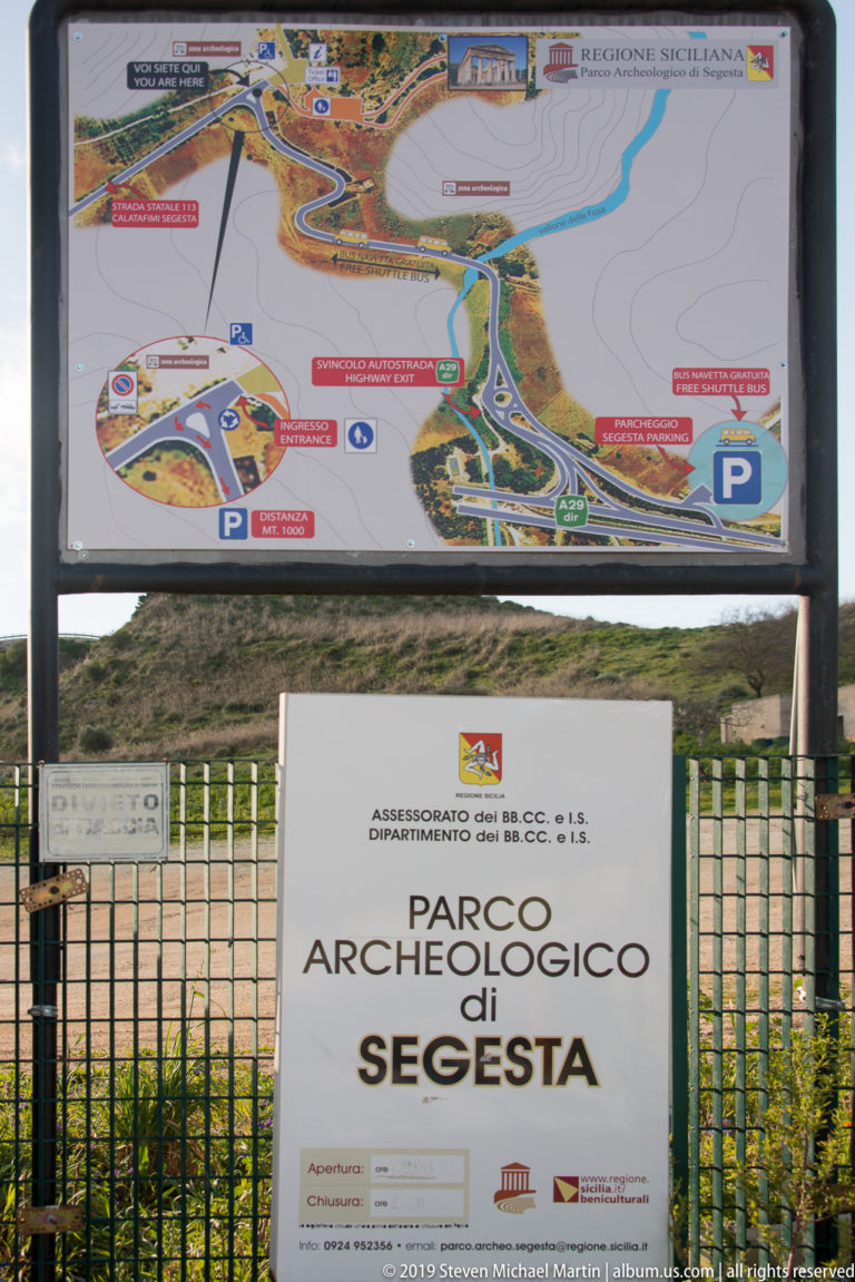 Entrance display with an illustrated map above a sign reading “Parco Archeologico di Segesta.”