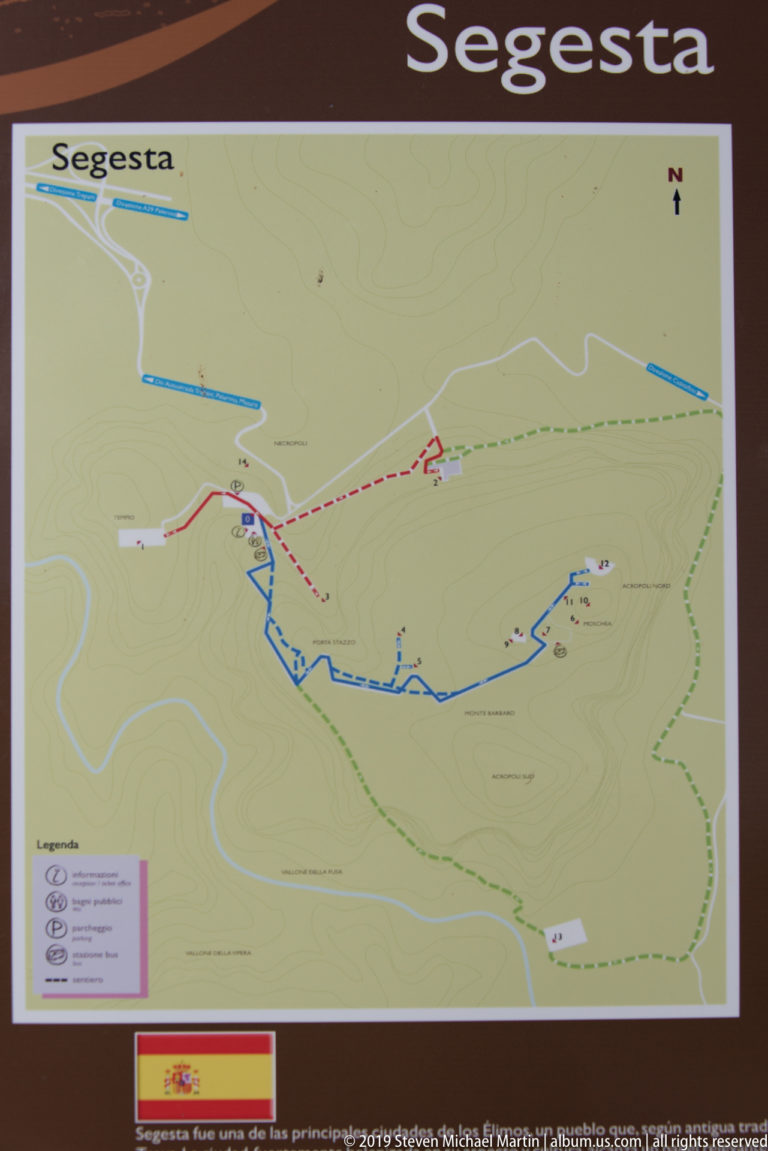Posted Segesta visitor map with colored routes, site symbols, contour lines, and a legend.