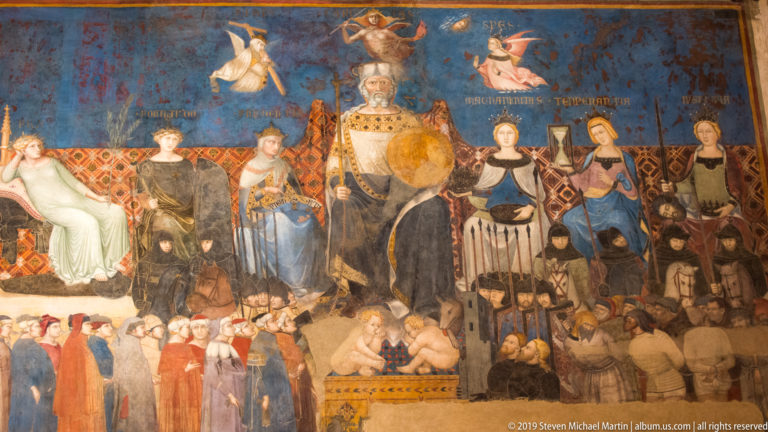 Enthroned personification of Siena’s government surrounded by civic virtues and smaller figures in Ambrogio Lorenzetti’s Good Government fresco.