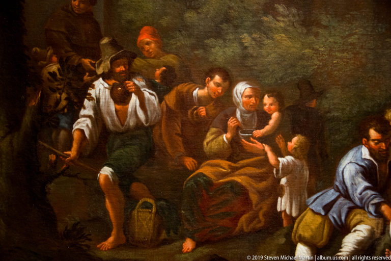 Travelers with staffs, vessels, and children rest together beneath trees in a dark landscape.