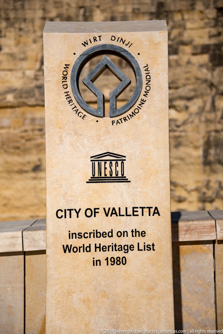 Stone UNESCO marker reading “City of Valletta” and stating its inscription on the World Heritage List in 1980.