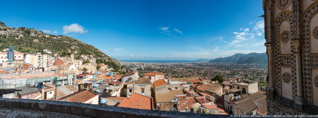 Rooftops on Monreale’s hillside overlook the Conca d’Oro and the distant Gulf of Palermo.