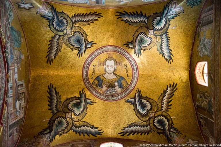 Christ enthroned in a gold medallion, surrounded by the four winged creatures of the tetramorph.