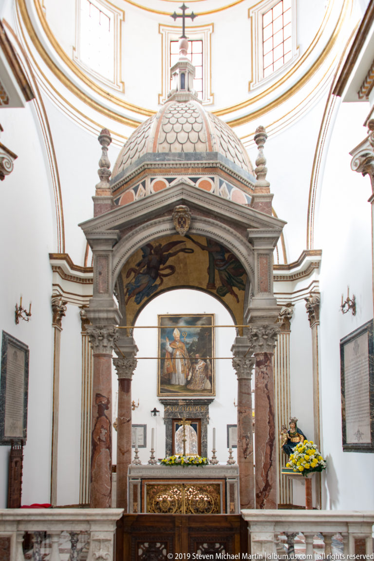 The domed marble ciborium and altar in the Chapel of San Castrense, seen beneath the high vault.