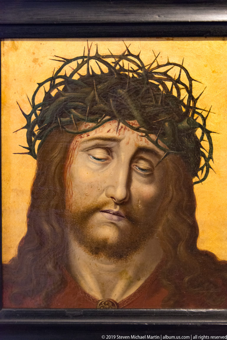 Christ’s dark-haired, bearded face fills a gold-ground mosaic, with only the edge of the halo visible.