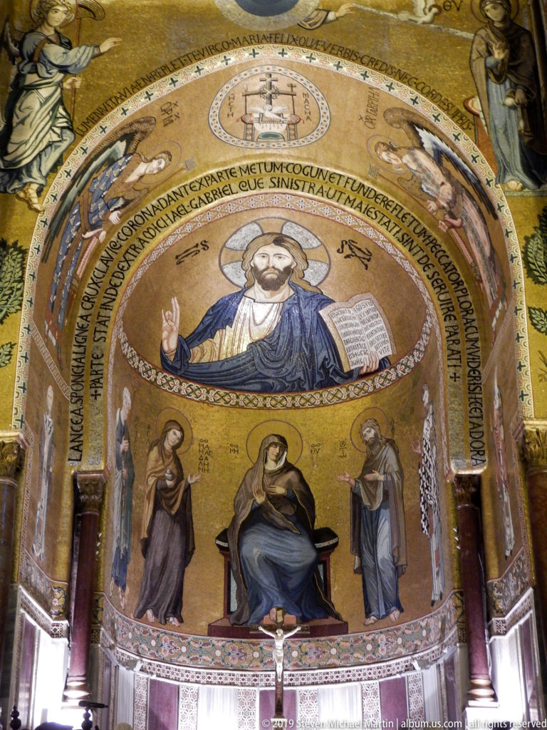 Gold mosaic apse with Christ Pantocrator above the enthroned Virgin and Child, flanked by standing saints.