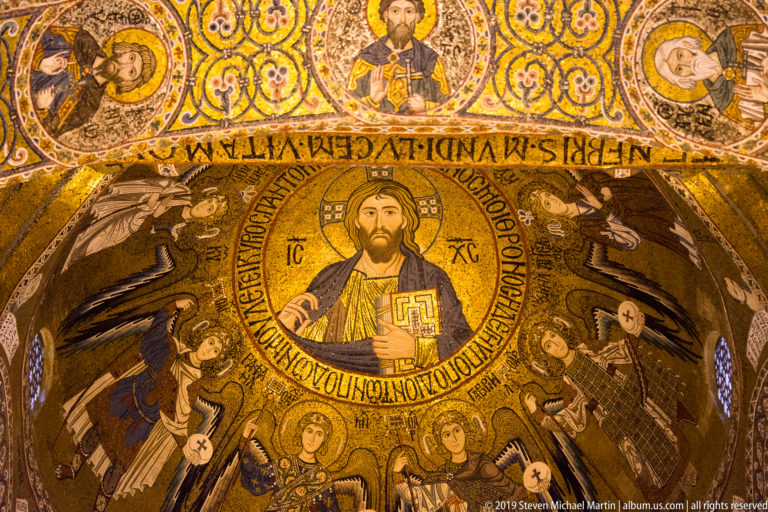 Christ Pantocrator in the gold-ground apse mosaic of the Palatine Chapel.