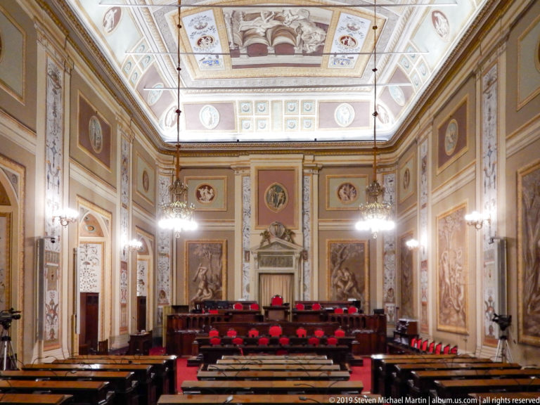 Frontal view of the ornate assembly chamber and raised dais.