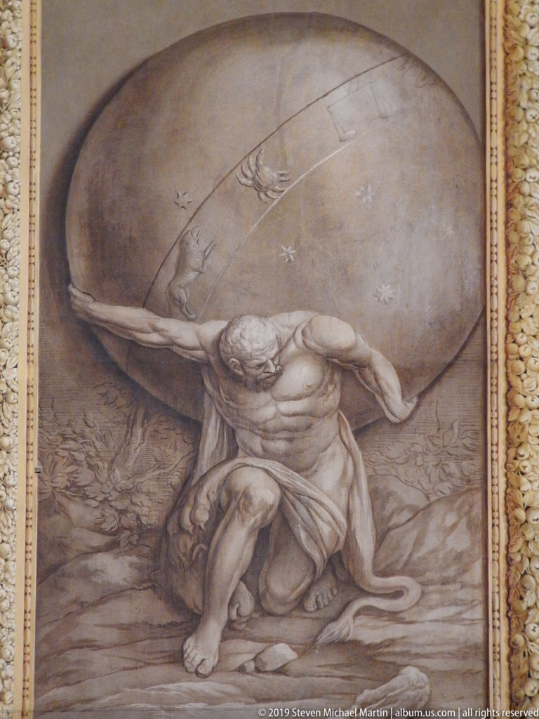 Atlas bearing a star-marked celestial sphere in a monochrome panel.